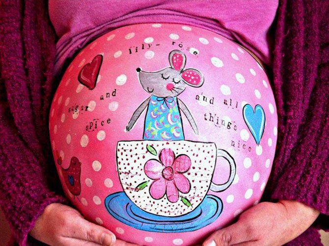 Рисунки на животах беременных девушек (9 фото)