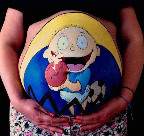 Рисунки на животах беременных девушек (9 фото)