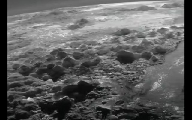 Вид на Плутон с американского зонда New Horizons