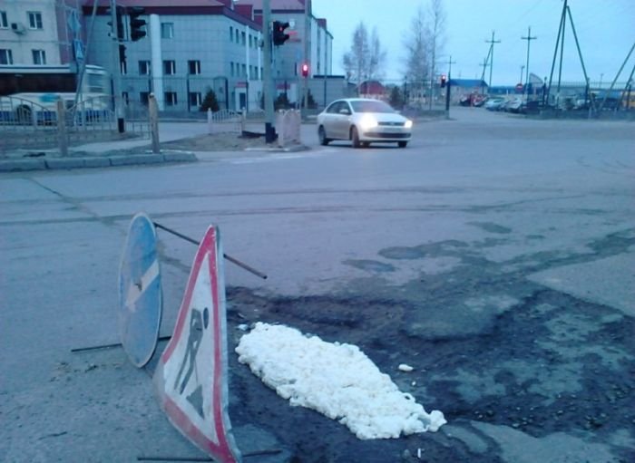 Ремонт дороги в Нефтеюганске (3 фото)