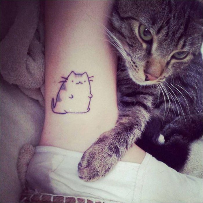 Татуировки у любителей кошек (19 фото)
